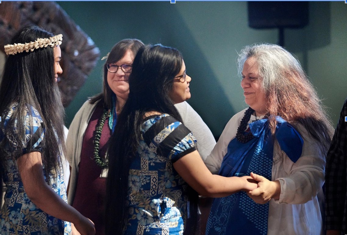 In March, the Enid group visited. Members of Chicago's Pacific Islander and Native American communities joined the Museum in welcoming them on the marae of Ruatepupuke II, a 19th century Maori meeting house that currently resides at the Field Museum.