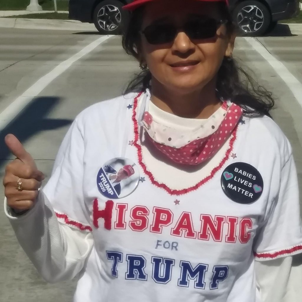 To be sure, here’s the Facebook profile picture of the woman who observed ballot counting alongside me all day and night inside Detroit’s TCF center last week. I’ll let you decide what team she’s on.