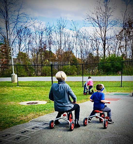It’s never a bad time for a trike race on a beautiful autumn day with a good friend 💕 #kindergartenlife #rollupuoursleeves #recess #Educator