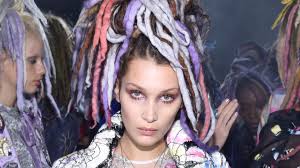 In 2016 she walked for Marc Jacobs 's fashion show with Gigi and Kendall. All the models regardless of their race wore dreadlocks. Now Bella is like Gigi, american with her mom being Dutch and her dad being Palestinian. That still did not give her a right to wear dreadlocks.