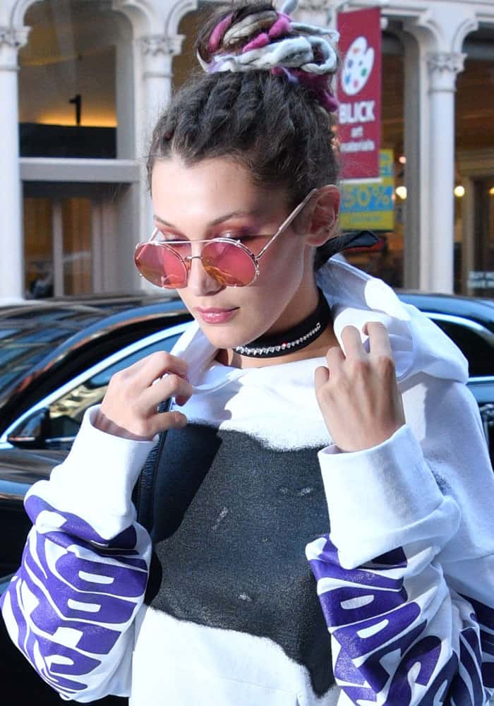 And then the day after the show she was seen still wearing them when she got to her hotel in NY where the show took place. Now as you can she, they clearly did remove some of the dreadlocks so why didn't she just let them take all of them off.