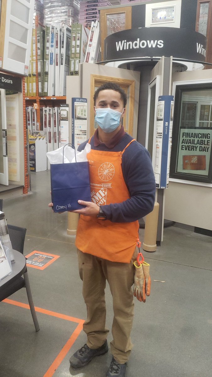 One of our many proud veterans, Corey Ham D21, receiving his Veterans Appreciation bag. You are AWESOME, Corey!