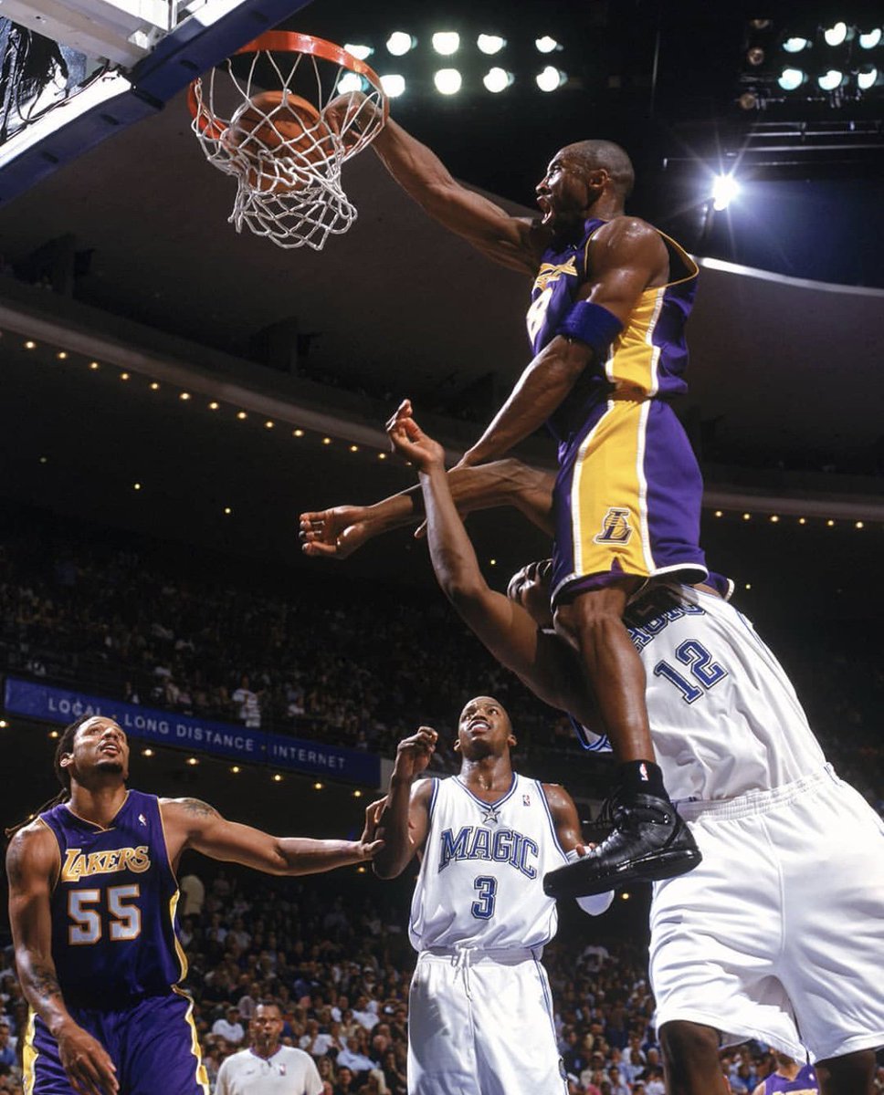 Ballislife's tweet photo. 16 years ago today, Kobe Bryant baptized Dwight Howard! 

One of the greatest posters ever. https://t.co/Dze8Kx0o0O