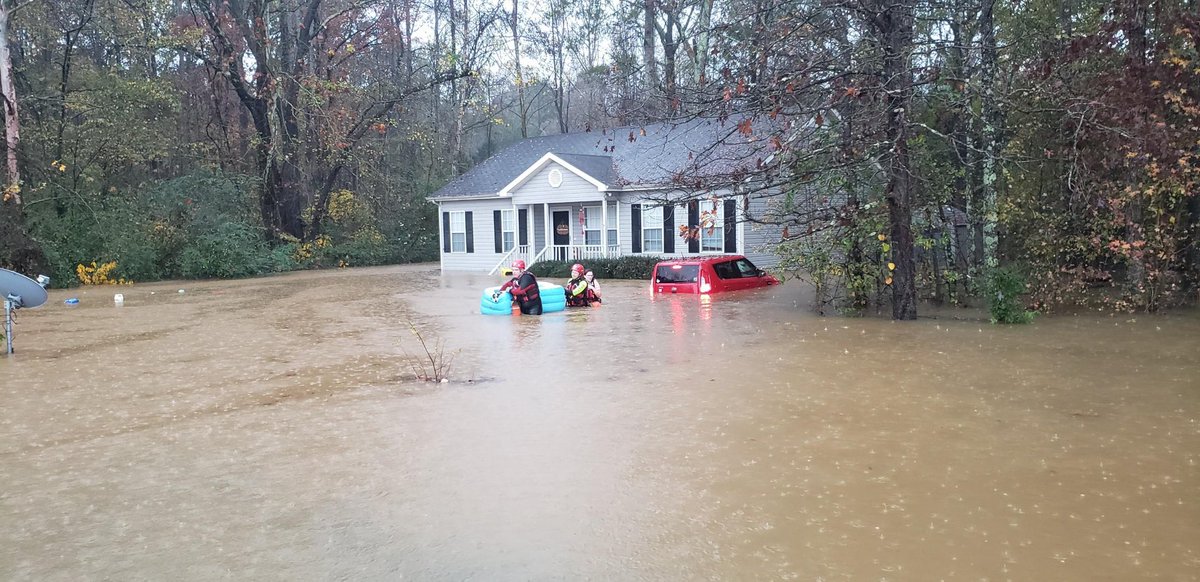 PIOYorkCountySC's tweet photo. York Firefighters just rescued a person from flood waters on Sheffield Drive at Nottingham. I’m told the person is now safe.  Pic from York Fire. https://t.co/XswiwGRKkc
