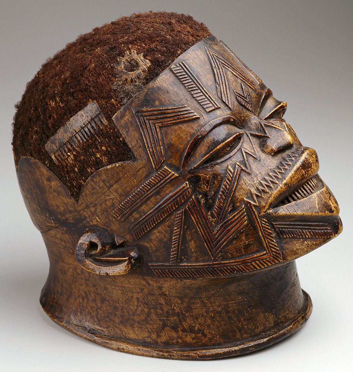 #173: Makonde People’s (Part 1)The mask below is an example of what was worn by the boys of Makonde during their reentry to the community after their completion of their rites of passage process. It displays how their faces & teeth were decorated for the probation.