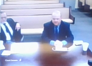 We're in a five-minute break now. For perspective, Greg and Travis McMichael appear in court via camera. They are set up at a table together in a different room.  @wjxt4  #AhmaudArbery