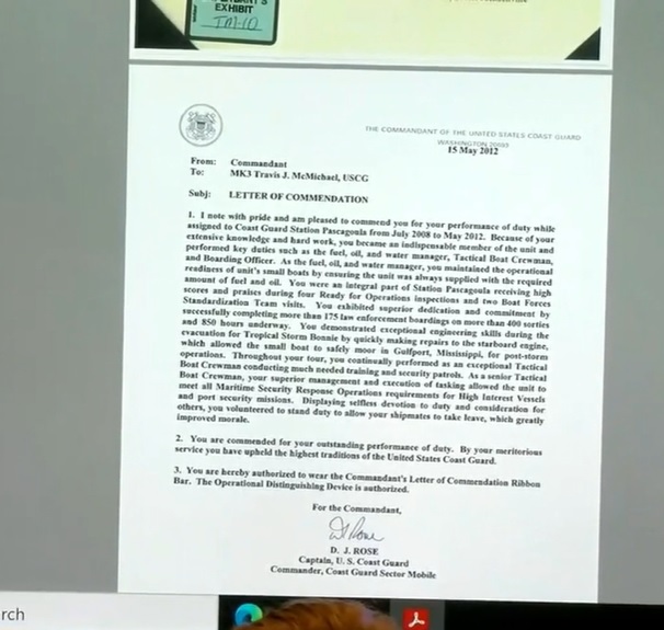 Allison McMichael identifies a letter of commendation to Coast Guardsman Travis McMichael, talks about things she learned he did by going through his documents; she says "He never told me about any of this"  #AhmaudArbery  @wsbradio