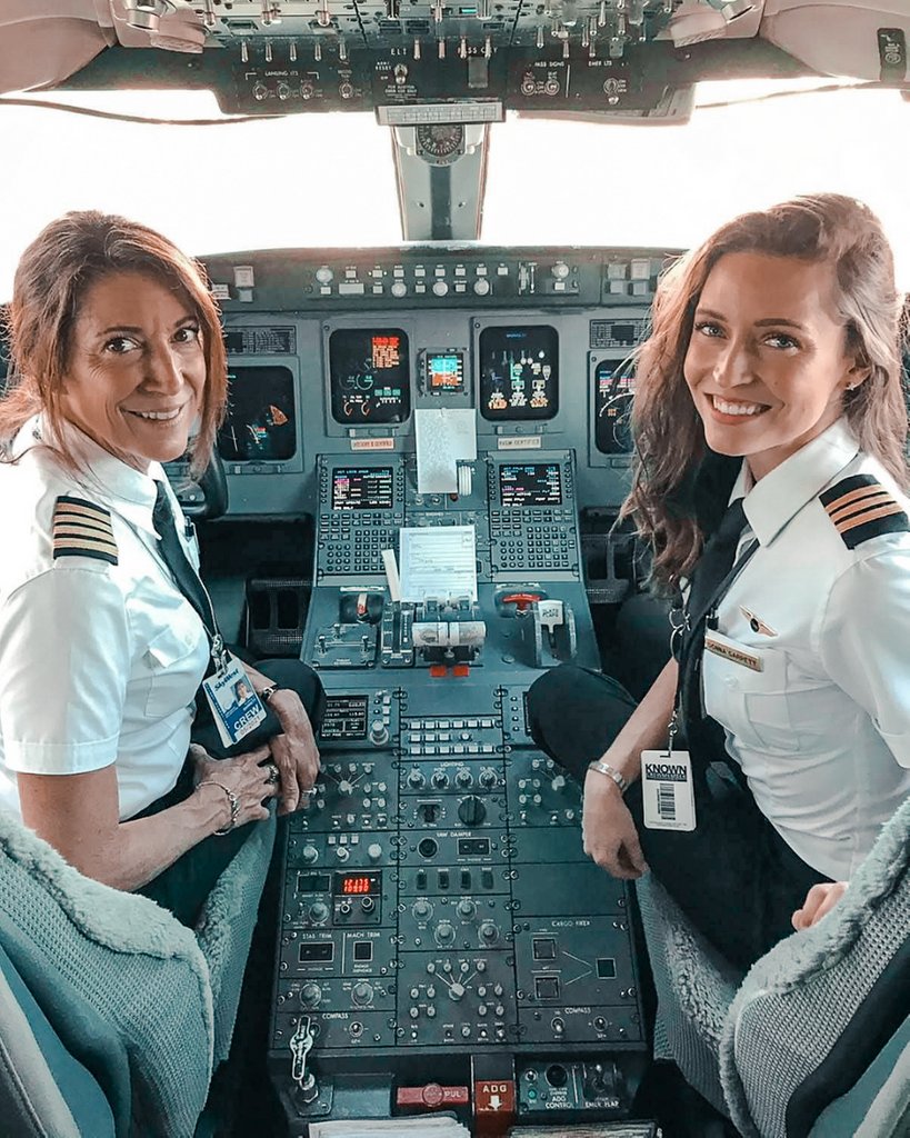 Cadence3Team's tweet photo. Captain Suzy Garrett and her first-officer daughter, Donna, are the first mother-daughter pair in history to pilot a commercial Skywest Airlines flight together. Suzy was one of the first dozen female pilots hired at Skywest and has been flying there for over 30 years. #feminism https://t.co/Xjffs8yHlV