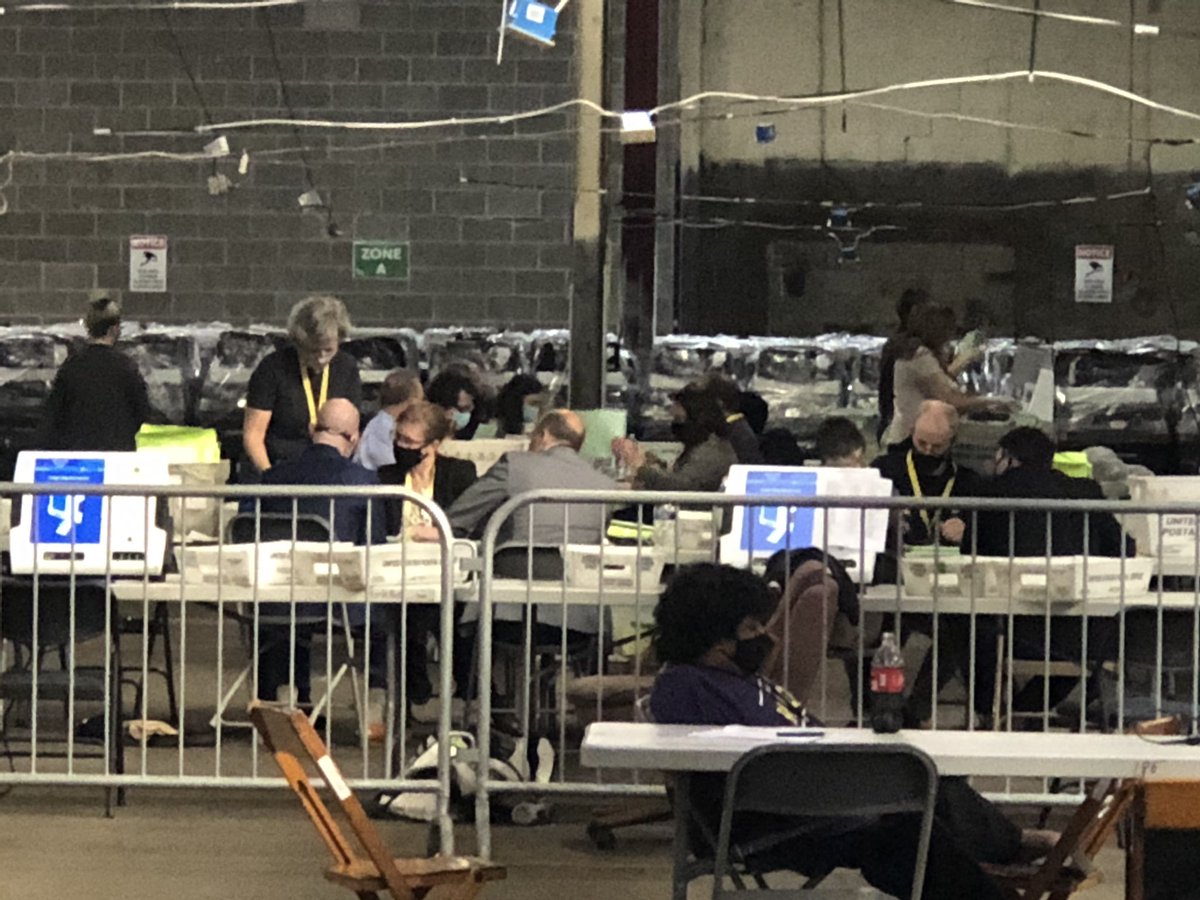 And on the other side of the room, you can see representatives from both sides opening provisional ballots together and going through them. Thus far, 539 provisionals have been “challenged” by both sides.