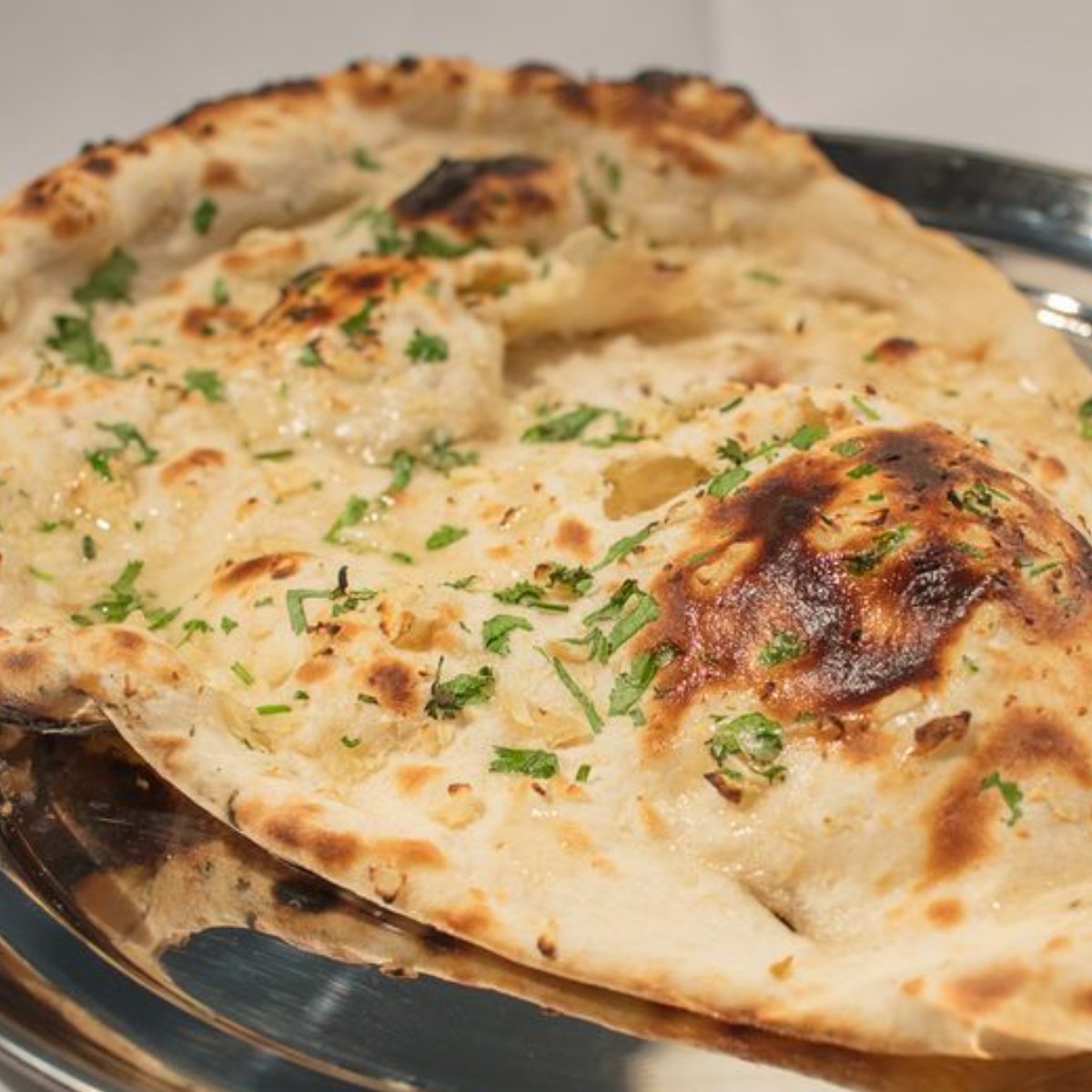 Naan is like a well-written story: The first bite hooks you, the middle is savored, and, by the end, you can't wait for another!