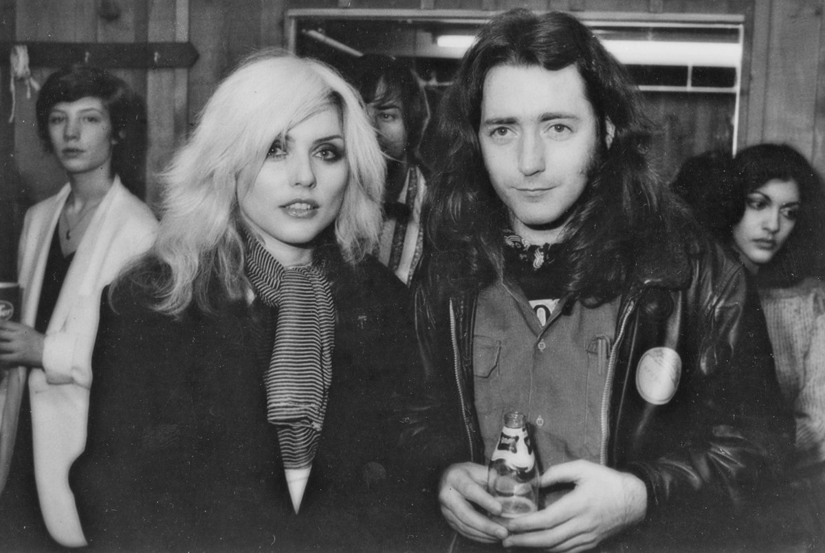 rorygallagher's tweet photo. #OTD  in 1978, during his American tour, Rory found himself with a night off in New York, so he went to see Blondie, Mitch Ryder &amp; The Detroit Wheels and Johnny Thunders &amp; The Heartbreakers at the Palladium. Mick Rock took this shot backstage of Debbie Harry and Rory. https://t.co/GMD0CxqRxy