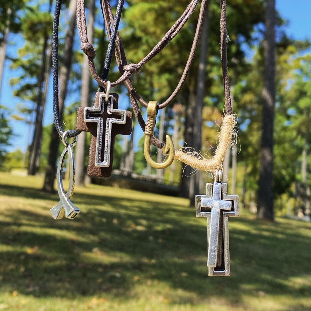 What are you repping? #thisispinecove #necklaces #cross #fish