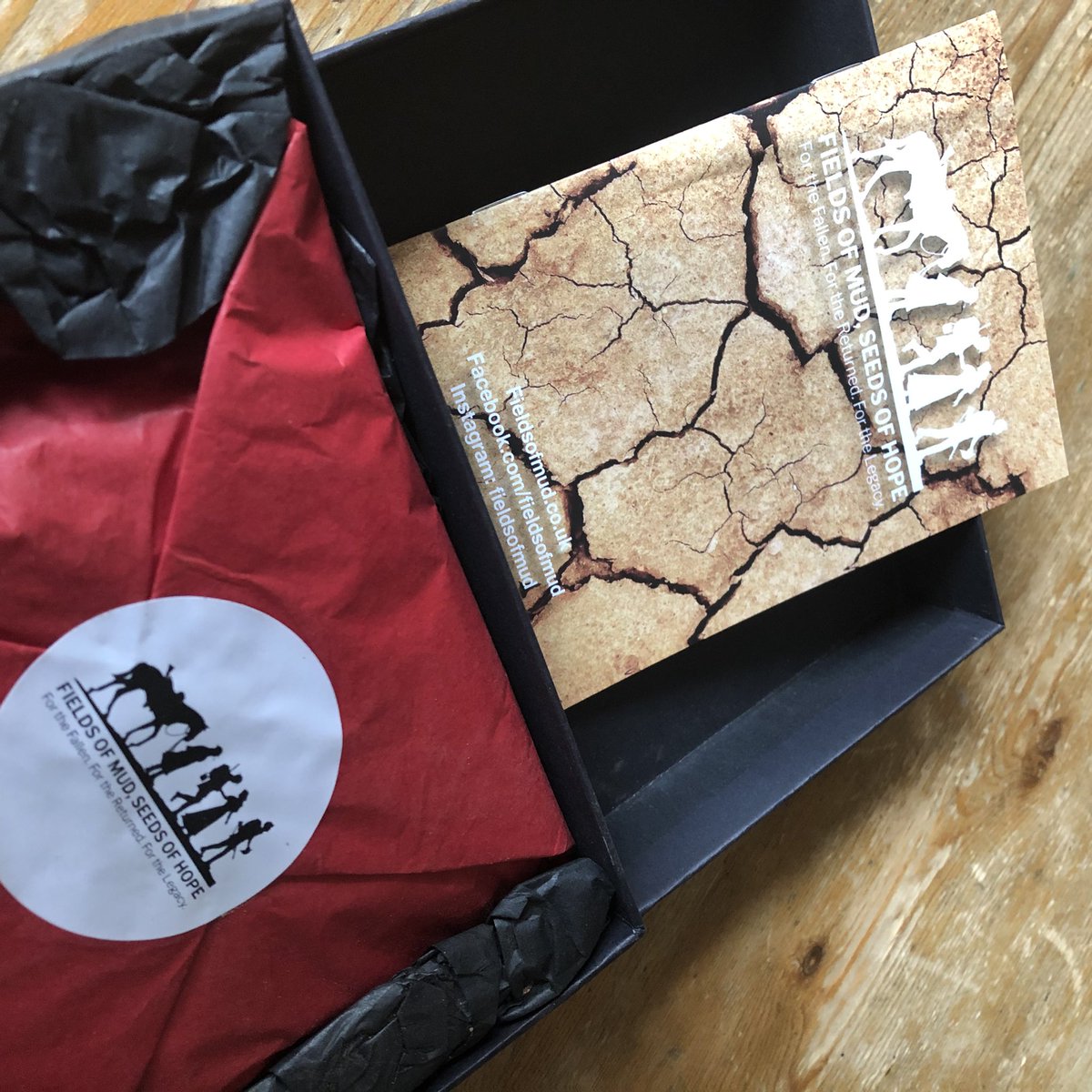 The mud sculpture, exhibited in the cathedral, had dormant poppy seeds within. The mud was broken up and sold with instructions on how to ‘rebirth’ the flowers.