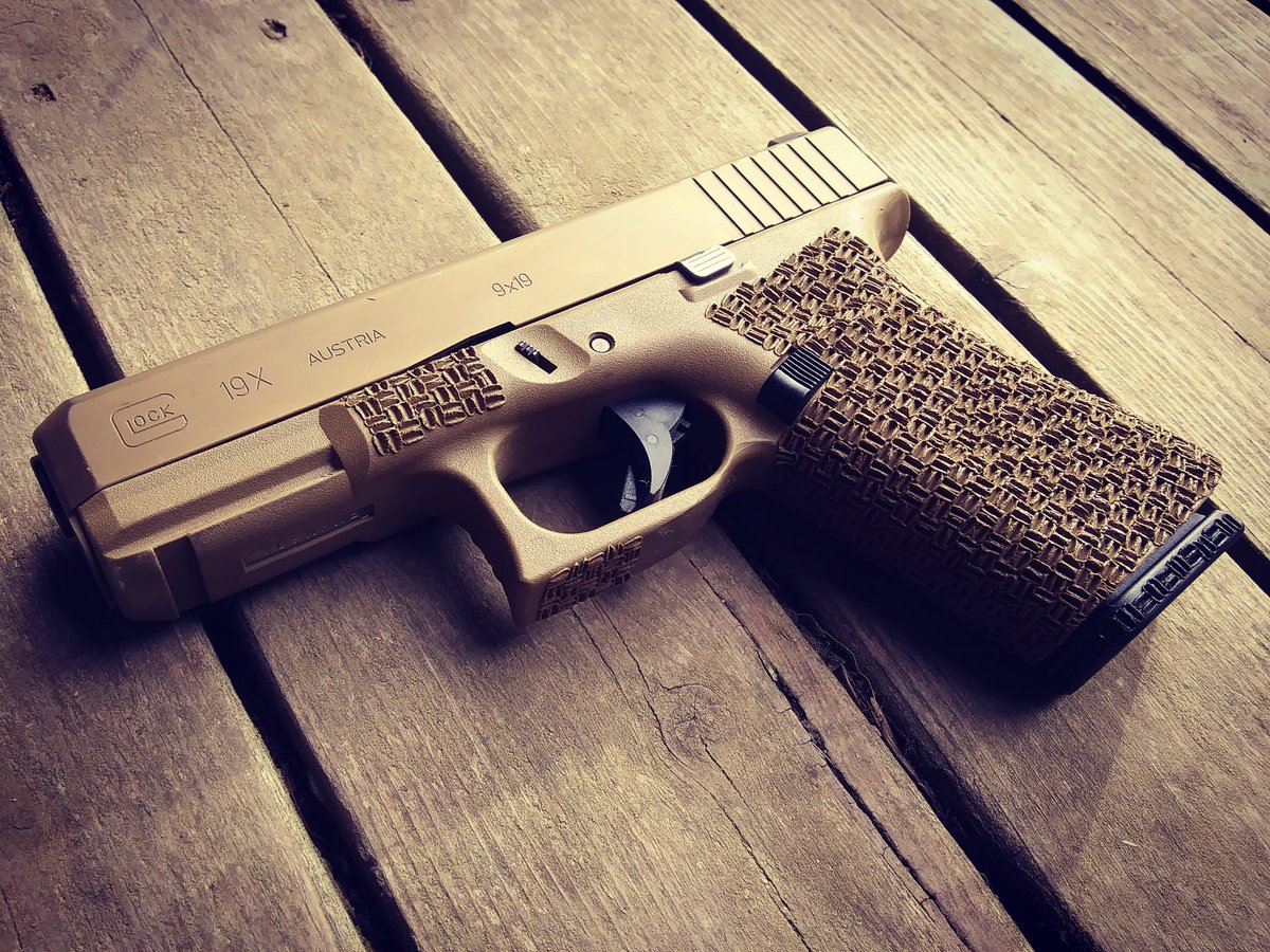AsymmetricalPr2's tweet photo. My #Glock 19X that I recently did a video about on #YouTube. The video explains why I cut it down, how I stippled it, undercut the trigger guard, and theory of use. 
@GLOCKInc 
#prepper 
#preppers 
#pewpewlife https://t.co/tG6C0pPxCk