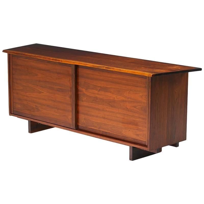 George Nakashima (1905-1990) was born in Spokane, but traveled the world studying architecture, forestry, and woodworking. His style is stunning, candid, and intensely interested in the imperfect beauty of his materials.