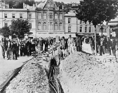 There were over 30 miles of cable produced with a joint every 20 feet!! These photos are from early 1900s cable laying. This was still a very new thing for ordinary folk to see. Trenches full of snaking power cables. What magic is this? [15/20]