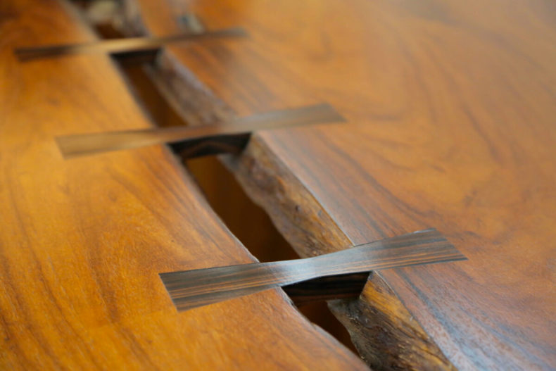 Which is why I love Nakashima's pieces so much: it's their radical honesty, their celebration of the material's beauty (and oh my GOD that wood is gorgeous) and their imperative to feature the wood's flaws ("flaws") as design elements.