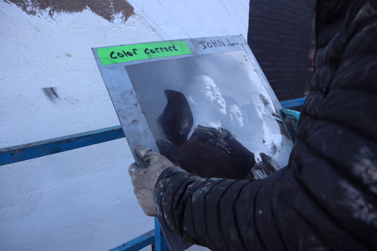 Both lifts are equipped with multiple reference images of Lewis that the teams use as their blueprint for their work.