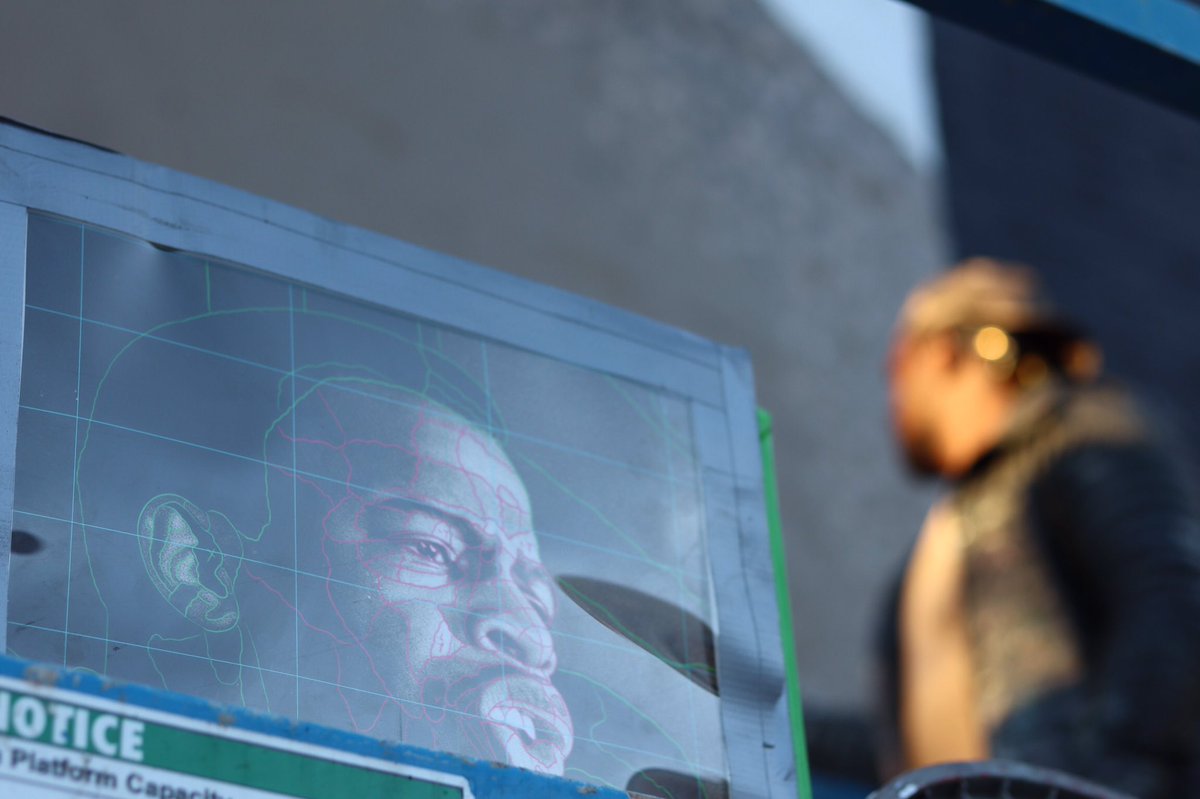 Both lifts are equipped with multiple reference images of Lewis that the teams use as their blueprint for their work.