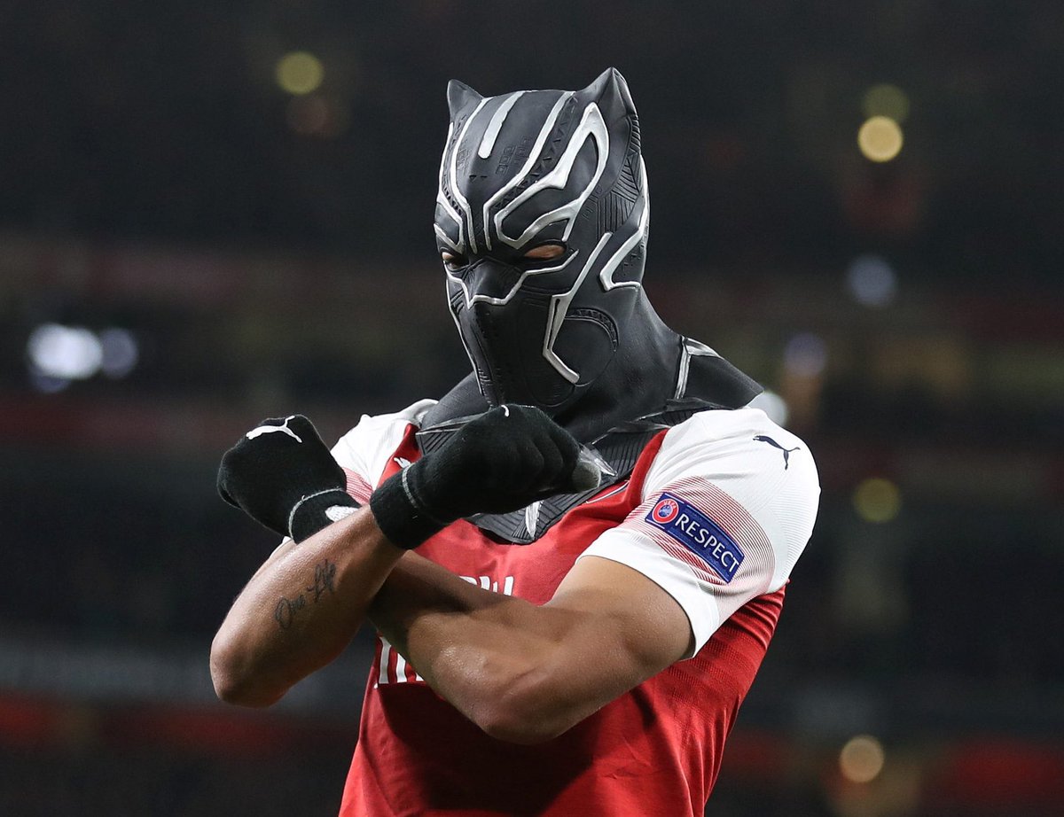 FootyHumour's tweet photo. Imagine if Real Madrid finish 3rd in their Champions League group, drop down to the Europa League, meet Arsenal in the final and Aubameyang scores a last minute winner and brings out the Black Panther mask and does this celebration in front of Toni Kroos. 😂😭😂 https://t.co/G1og8iYIam