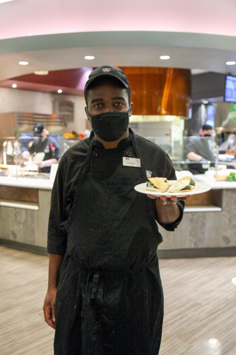 CarletonDining's tweet photo. Meet Kihinda! He’s one of our amazing cooks 👨🍳 who prepared a Beef Kofta with some homemade Tzatziki and all wrapped in a pita 🥙 for dinner! Look forward to more cool features and the delicious dishes they create! #cookfeature #beefkofta #pita #tzatziki #thecaf #diningservices https://t.co/xZ3KIS8QxP
