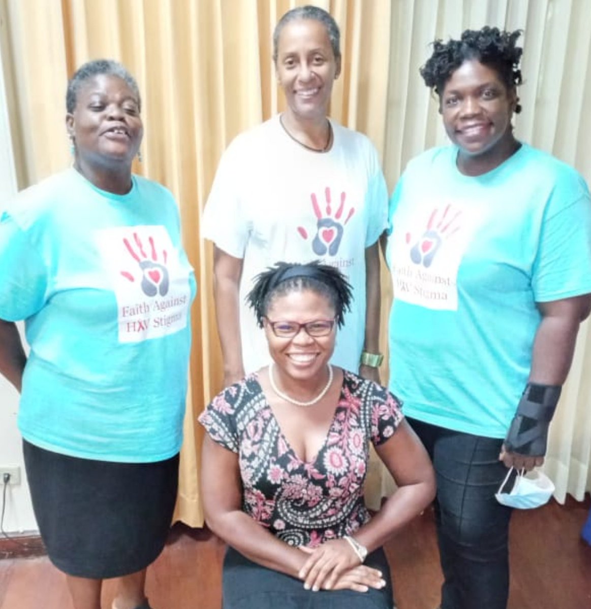 FaithHIVStigma's tweet photo. #TeamFAHS of Marsha Nathalee Martin, Juliet Hall and Kameaka Duncan-Pottinger, pause for a pic w/ Denice Tulloch (c, back) of Baha'i Faith, following their stimulating workshop today w/Faith-based Organization leaders on HIV Stigma & Discrimination and Gender-based Violence. https://t.co/xcwZms19ar