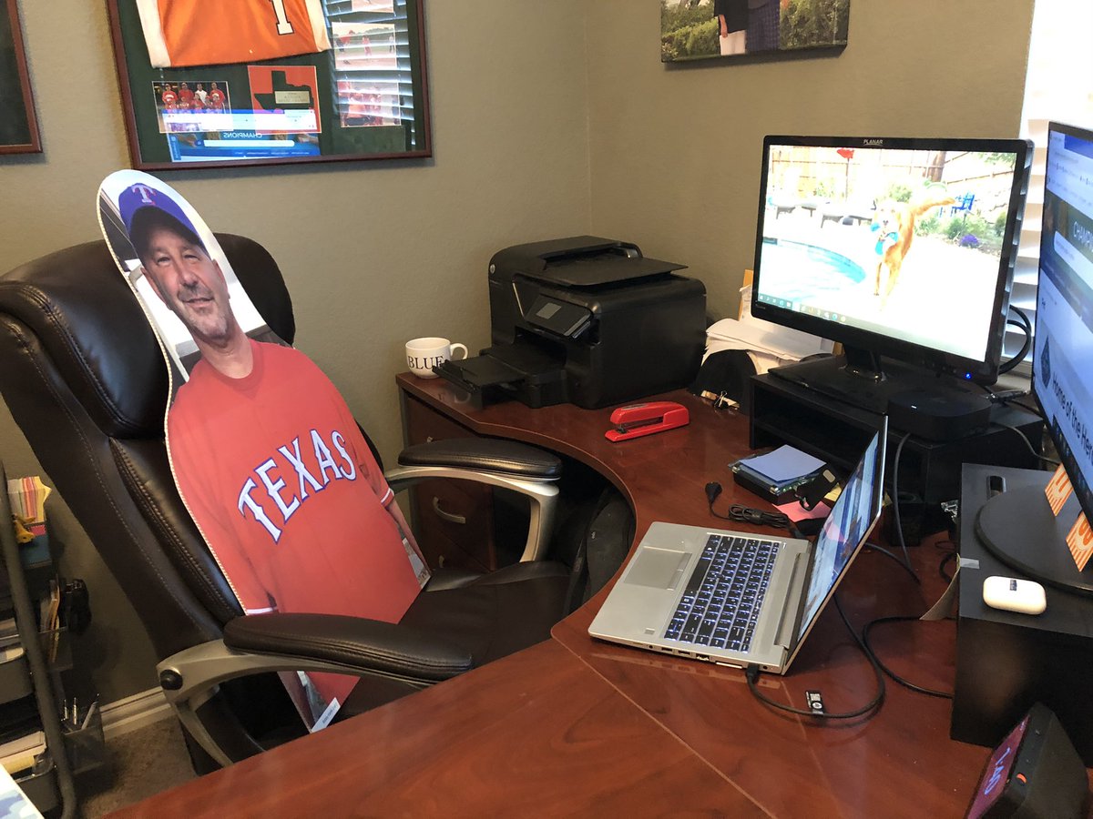 bktexas33's tweet photo. Now that baseball is over, my cardboard cutout made it home from the ballpark. I am repurposing it as my stand in for some of my not so interesting Zoom calls. @Rangers https://t.co/e2Spw0aDAC