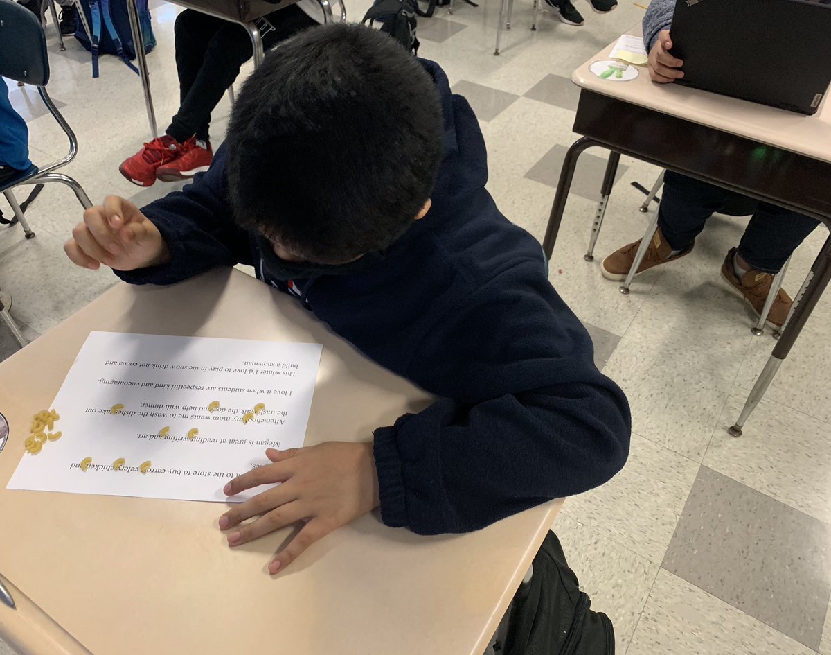 cbsruggiero's tweet photo. We turned our grammar lesson into a hands-on activity! Each student received his/her own noodles to use as commas in our mentor sentences. When they were finished, Ss were able to create their own sentences as well! Thanks for the inspiration @acarvalhocb 😁🍝 #CBProud https://t.co/TjRFmo7VVY