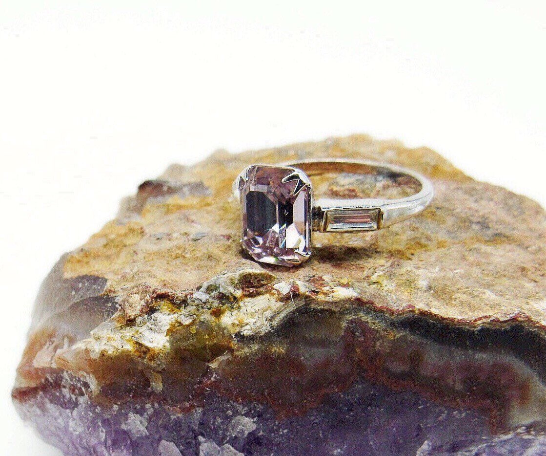 Carolan48753054's tweet photo. Excited to share this item from my #etsy shop: Dazzling Uncas vintage Art Deco Sterling Silver brilliant faceted Emerald Cut Pink Quartz Crystal baguette accented size 9 Ring #antiquepinkquartz #uncasquartzring #vintageuncasring https://t.co/41qLxER1LL https://t.co/lJwRGbMRg8