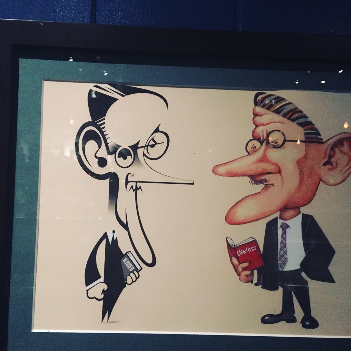 Happened upon this caricature  of T.S.Eliot & James Joyce at Ulysses Pub , Stone Street in Fidi.  Eliot, one of the first critics to write a glowing response in the 1930’s to the highly controversial novel by Joyce, “Ulysses”.  
#jamesjoyce #tseliot #ulysses #modernliterature
