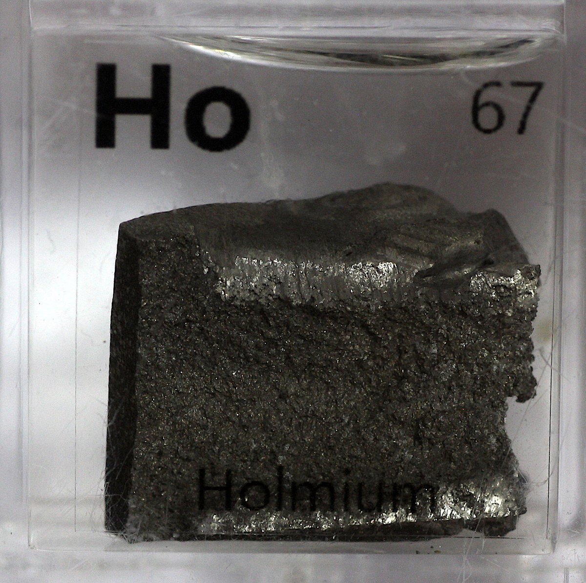 Holmium  #elementphotos. Pink compound is holmium oxide (Ho2O3).