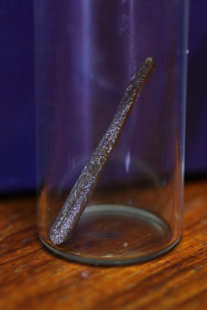 Holmium  #elementphotos. Pink compound is holmium oxide (Ho2O3).