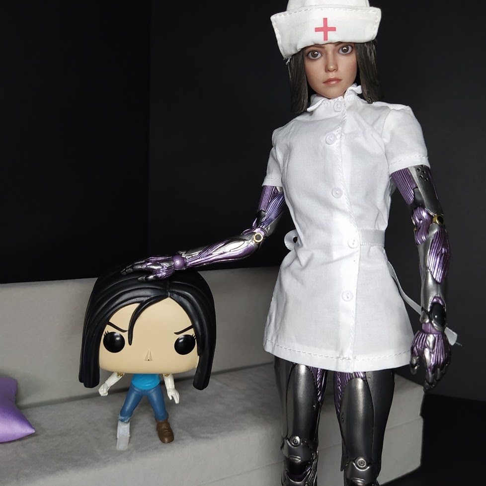 vladdie777's tweet photo. You may remember Little Alita had a fall and broke her foot which somehow disappeared, well thanks to @MuscogeeCreek for sending a little prosthetic foot and to Nurse Hot Toys Alita she can now stand up on her own again! ππ¦Ώ #Alita #AlitaArmy #HotToys
https://t.co/QAcMc2RGBp https://t.co/WNu9rt9LZM