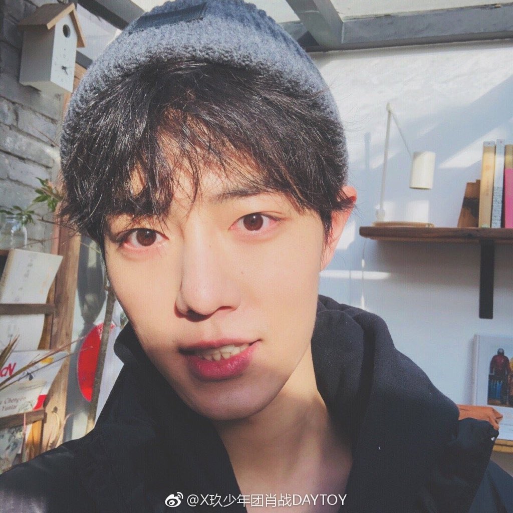 xiao zhan in a beanie selfies: a thread