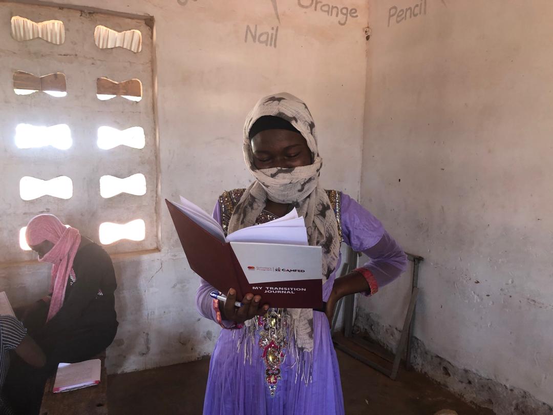 llysa200's tweet photo. In small clusters, the young women come together to recieve guidance from their @Camfed Transition Facilitators on life skills and varied pathways to their economic independence. They document their journey and aspirations in a journal. #CAMAEffect  @youngafricawks https://t.co/ApcWr4vP8f