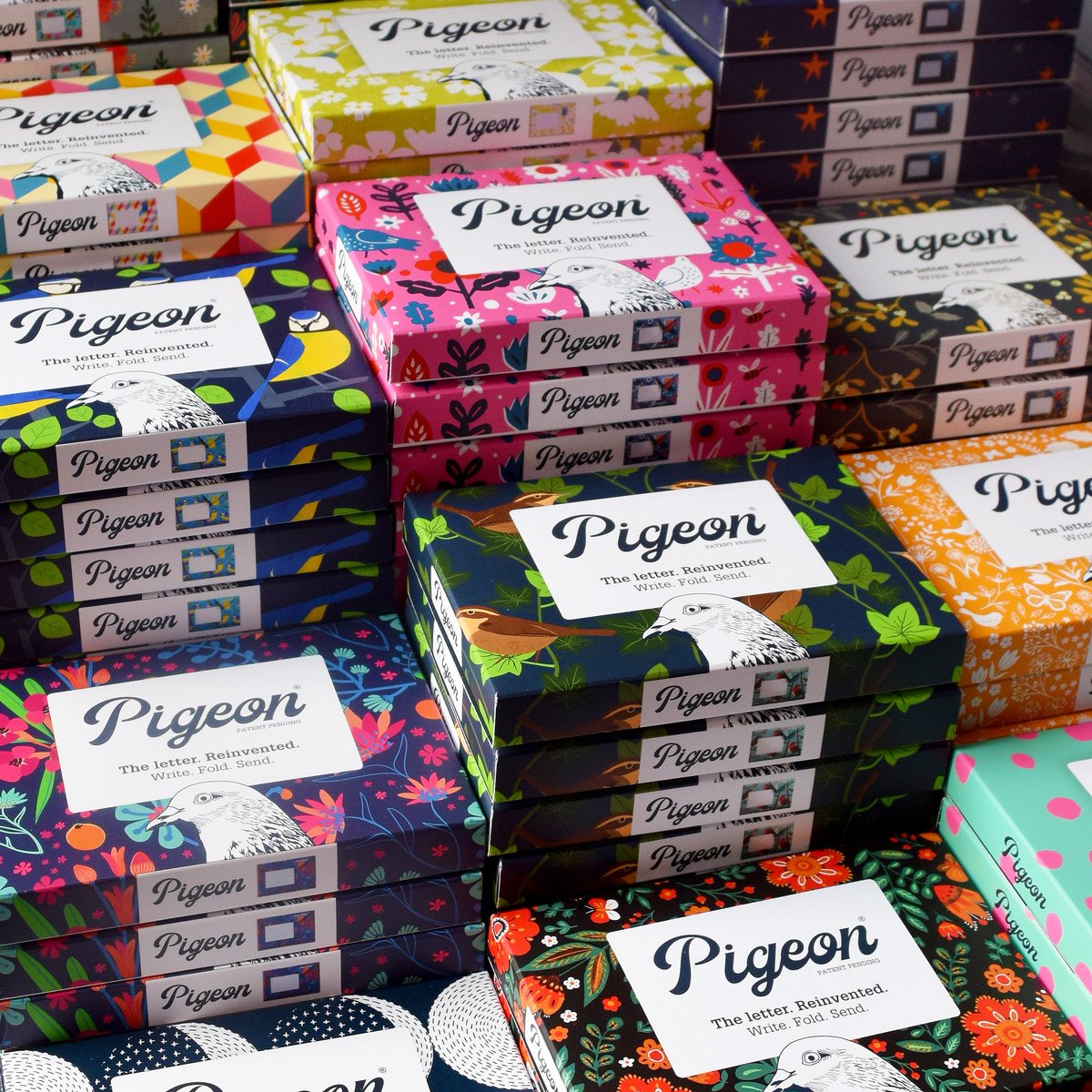 It's been a mad week of folding (early) and packing (late) this week, so I'm glad I still have some folded stock left at the end of the week. Thought you'd like to see a pic of them all together on their little Pigeon table.