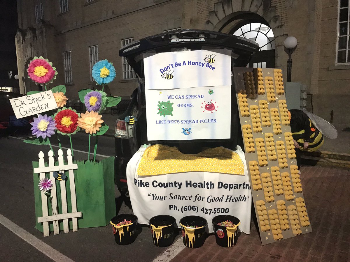 PikeCountyHD's tweet photo. We participated in a contactless, drive-through event, Nightmare on Main, in Pikeville recently. Families were encouraged to drive through the event and receive treats. Our theme was “Don’t Be a Honeybee” and we highlighted Dr. Steven Stack’s garden #TeamKY  #maskupky https://t.co/GEaAg28Nql