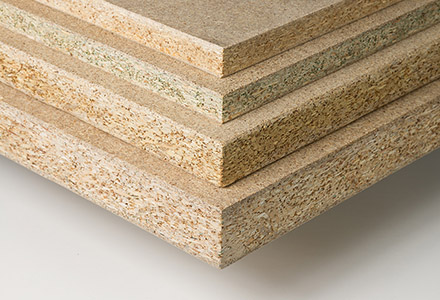 Particle board (chipboard) is a low-density material that makes use of waste wood flakes, mixed with glue and highly compressed. Like plywood and blockboard, it can be faced with a variety of materials, machined to create profiles and available in various grades. /8