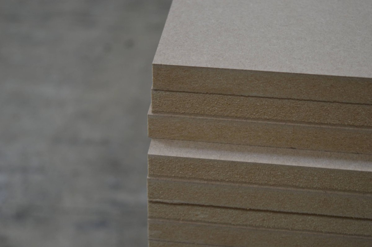 Medium Density Fibreboard (MDF) uses pressure treated wood fibres and bonding agents to create a stable, strong and easy to machine product. It is much denser than chipboard and cheaper than plywood. The core and face tend to have a slightly different density./14