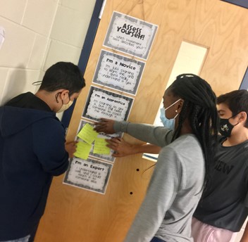 tOsborneIF's tweet photo. Mrs. McClinton’s students complete 5 problems as an exit ticket. They self-assess their own understanding by placing their sticky note on the door chart. Mrs. McClinton pulls small groups for differentiated re-teaching based on self-assessment &amp; work. @glenview_middle #GMSbuzz https://t.co/UKJ8mT9YMa