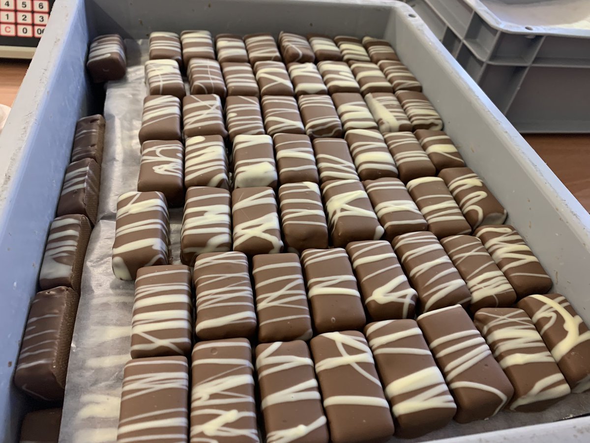 kpullen40's tweet photo. When you work in a chocolate factory and spend most of your day packing this amazing stuff while trying not to eat most of it and listening to @lspraggan on repeat!! 🍫 🎧 
I don’t know if I have a addiction to the chocolate or @lspraggan 🤔 https://t.co/KeTyopA6c3