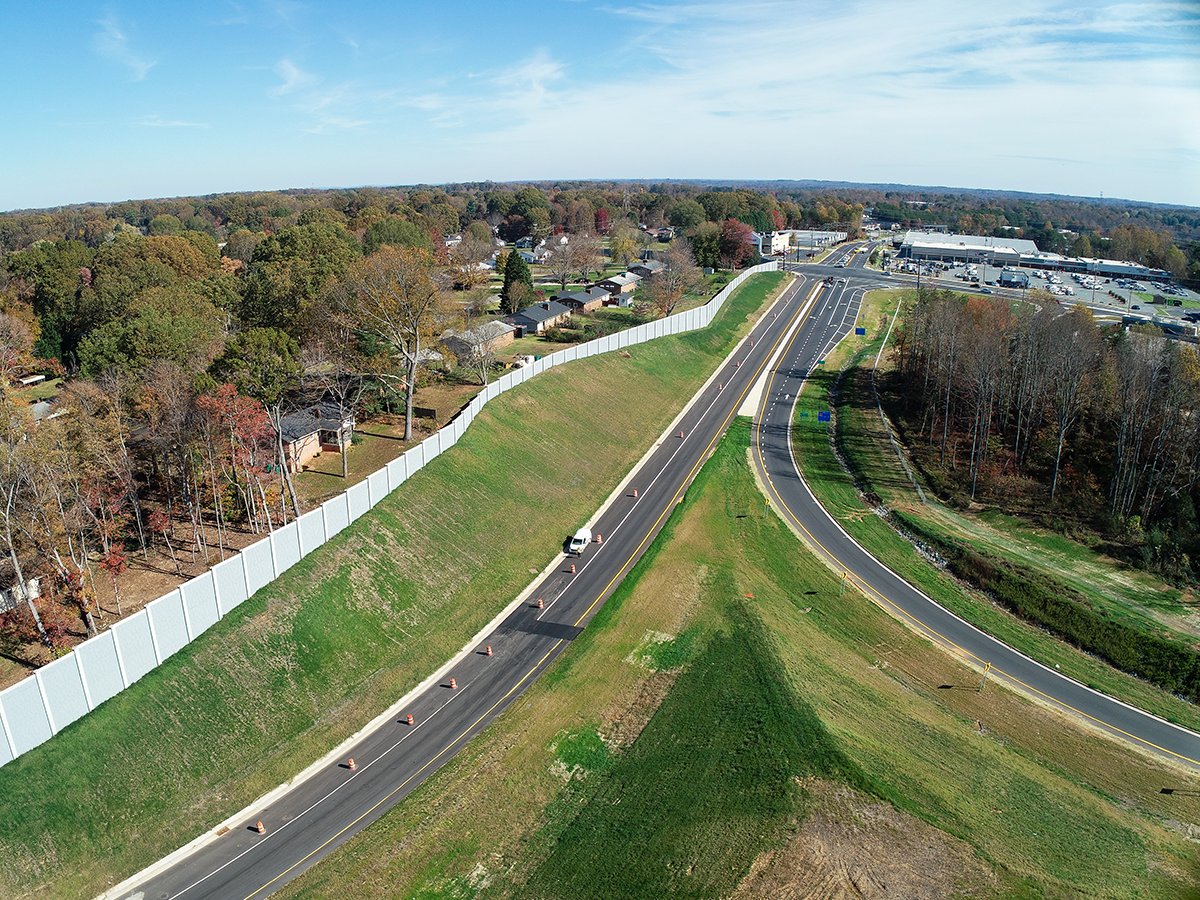 BlytheConst1's tweet photo. Blythe Construction teams are hard at work on multiple sections of the Winston-Salem Northern Beltway! Future US-52 alignment is currently underway, and ramps and loops of the NC65/US52 interchange are now complete. #WinstonSalem #NorthernBeltway https://t.co/TxpLyZ47Ab