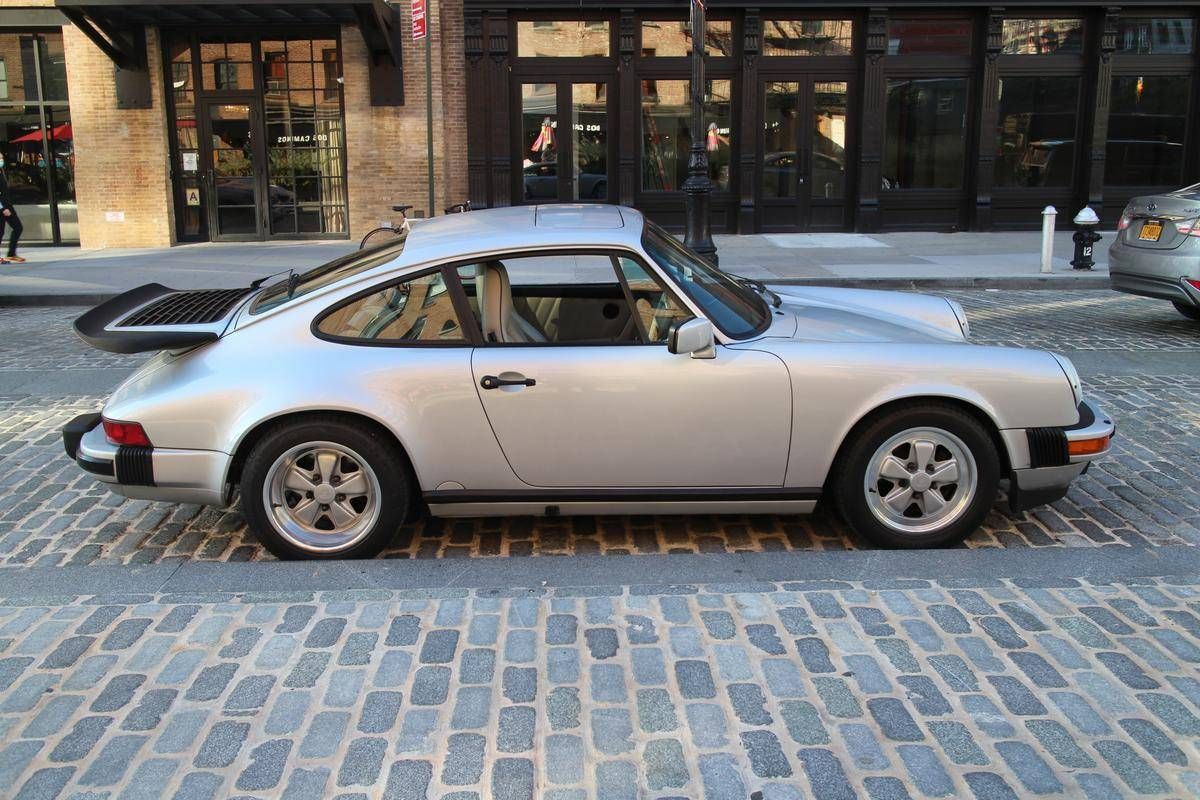 porschelife31's tweet photo. This 1989 #Porsche 911 Carrera is equipped with the special 25th Anniversary Edition package and is finished in Silver Metallic over a Silk Grey interior. It only has 19k miles and is equipped with the  G50 5 speed manual transmission. #Classifind

▶️ https://t.co/PpAaRjFJuD https://t.co/eQ4XWA2DX3