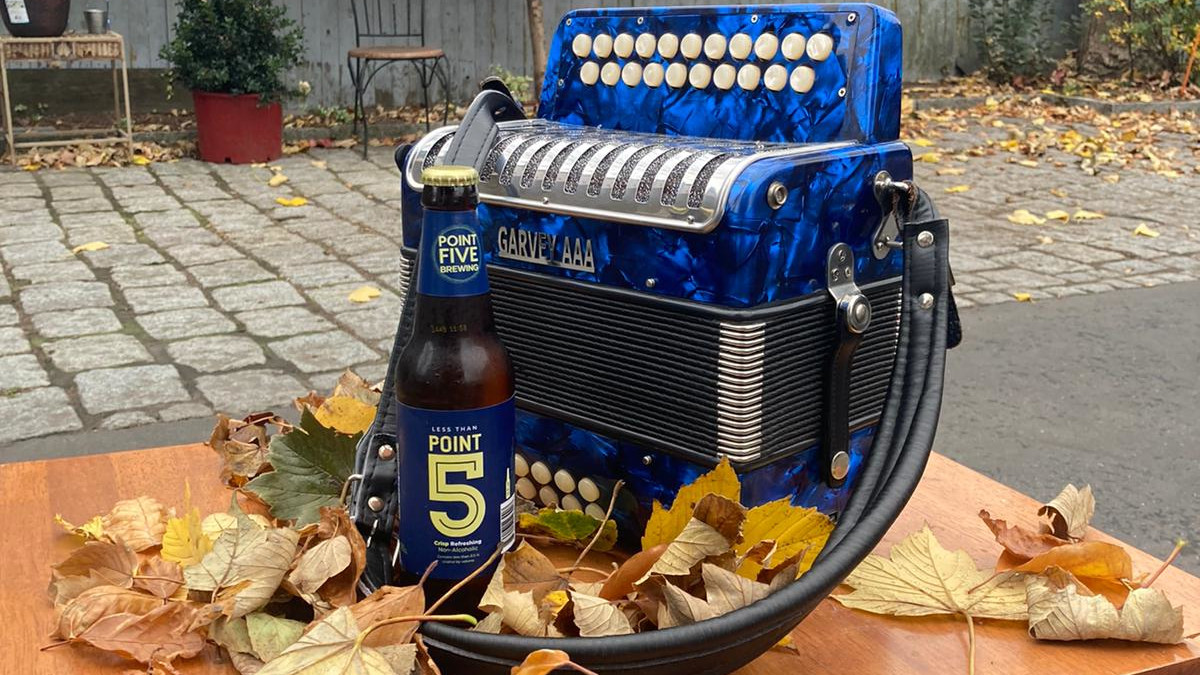 RonanKMcGovern's tweet photo. Taking a pause from the preparations for our big reveal next week to step into the garden and enjoy what's left of the autumn and... these two beauties - A Point 5 non alcoholic beer and my Garvey accordion. Let the music play on.😃 🍺🍁🍂 🎼

#nonalcoholic https://t.co/Mjkvh5Xyt4