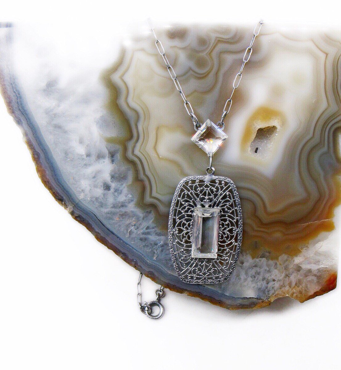 Carolan48753054's tweet photo. Excited to share this item from my #etsy shop: Vintage 1930s Art Deco Rhodium Plated Filigree faceted Emerald Cut and round Crystal accented Lavaliere Necklace #1930sartdeco #artdecorhodium #1930snecklace #artdeconecklace https://t.co/eEnF82ukCo https://t.co/aO7TNG22m2