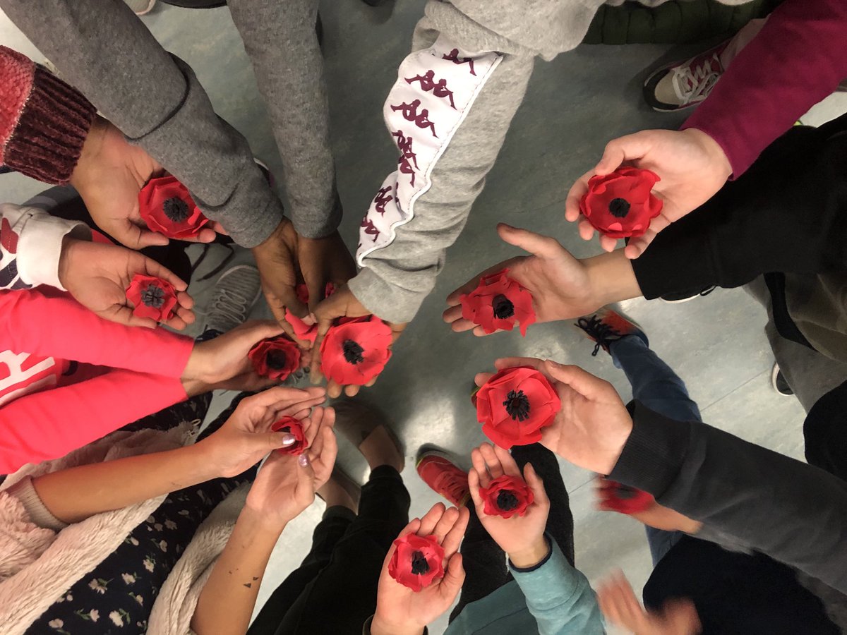 EColdbeck's tweet photo. #SuperCappy students make poppies of Remembrance. Important symbols to learn from. https://t.co/PfW8tGr6pe