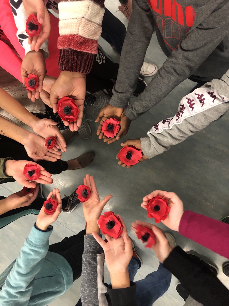 EColdbeck's tweet photo. #SuperCappy students make poppies of Remembrance. Important symbols to learn from. https://t.co/PfW8tGr6pe