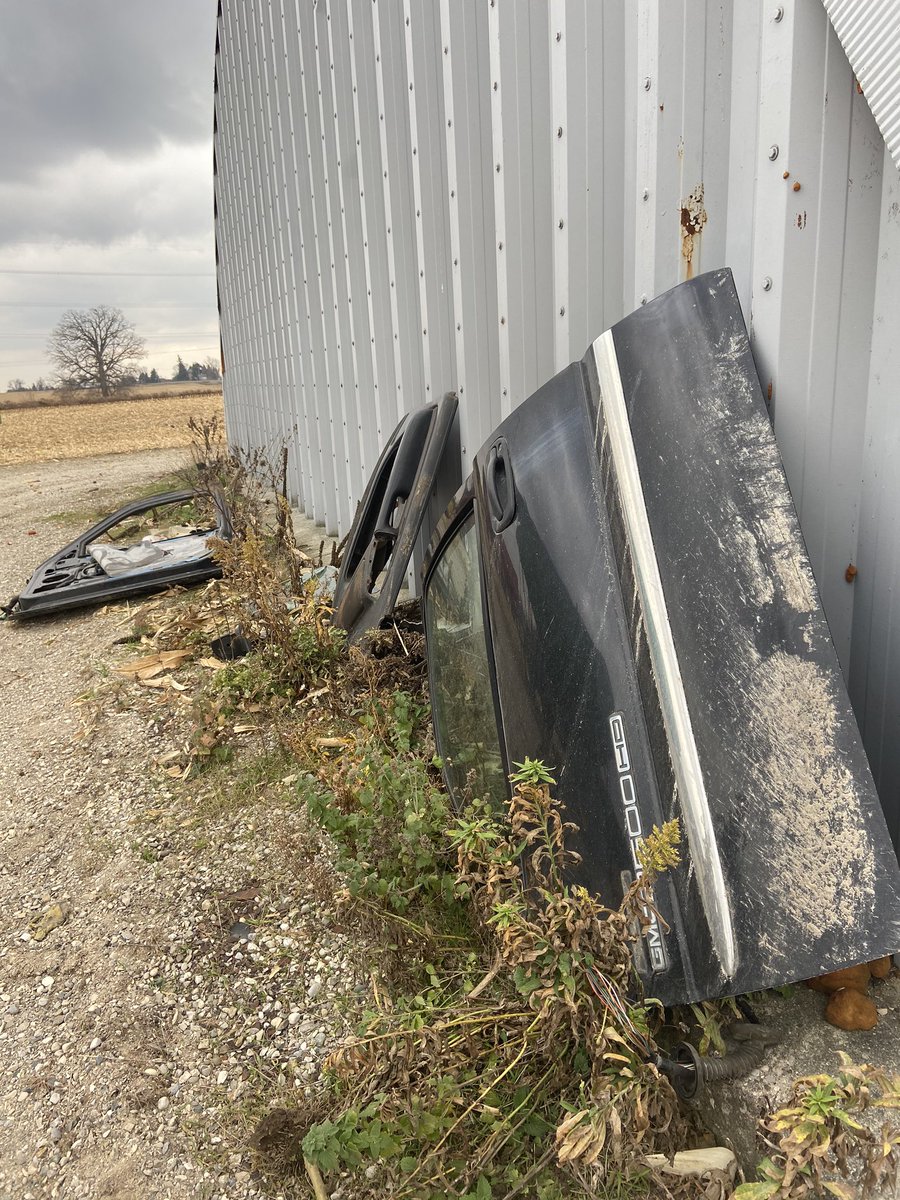 This gets me pissed off 😡 some threw a pair of pickup truck doors in the corn 🌽 field almost crashed in to them with the corn head