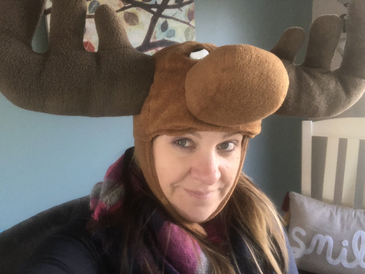 Mrs_Hlinak_WMS's tweet photo. I tried a pink fire hat, a cowboy hat, a Viking hat and a Packers stocking hat, but this one got the most reaction today 😆 (including one “oh my god” and an “I like your hat!” from two students who NEVER talk during class!) #pandemicteaching #VirtualHatDay #wms118life https://t.co/tY5AN5lNFu