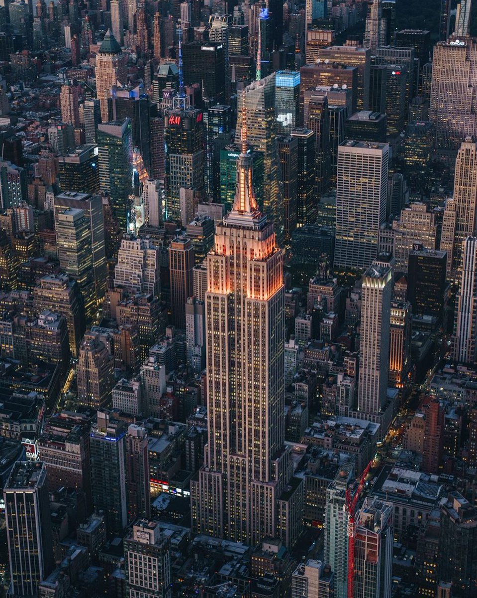 EmpireStateBldg's tweet photo. Happy #Diwali from NYC! 

We’re joining @FIANYNJCTorg in celebrating the festival of lights by turning our own lights all orange tonight! #ESBright 

📷: filipspinka/IG https://t.co/6QKyZlNHsF